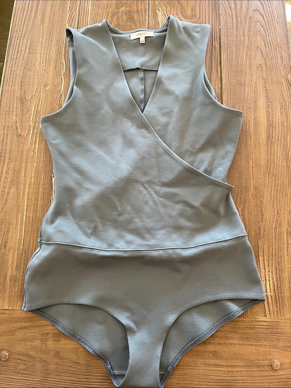 Babaton Sleeveless Wrap Bodysuit in Dusty Blue